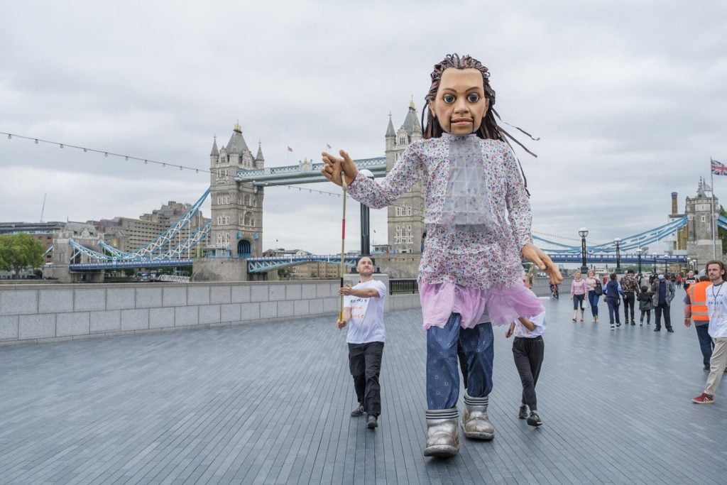 Good Chance theater company, The Walk, featuring the Little Amal puppet created by Handspring Puppet Company, as seen in London. Photo by Nick Wall, courtesy of Good Chance theater company.
