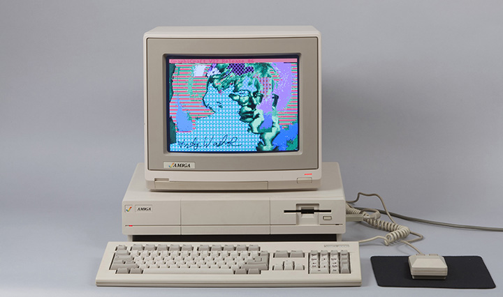 Recreation of Andy Warhol’s Amiga 1000 displaying one of the digital self portraits he made using the computer. Photo courtesy the Warhol Museum, Pittsburgh.