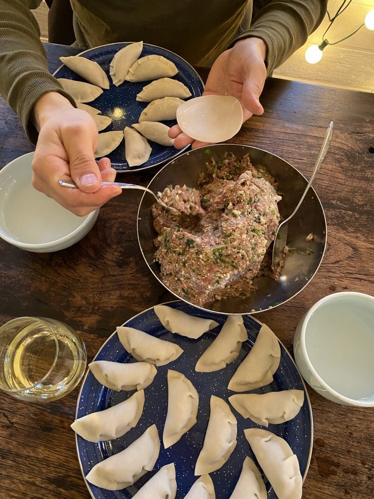 Making <em>mandu</em>, a traditional Korean dumpling. Photo courtesy of Jean Shin. 