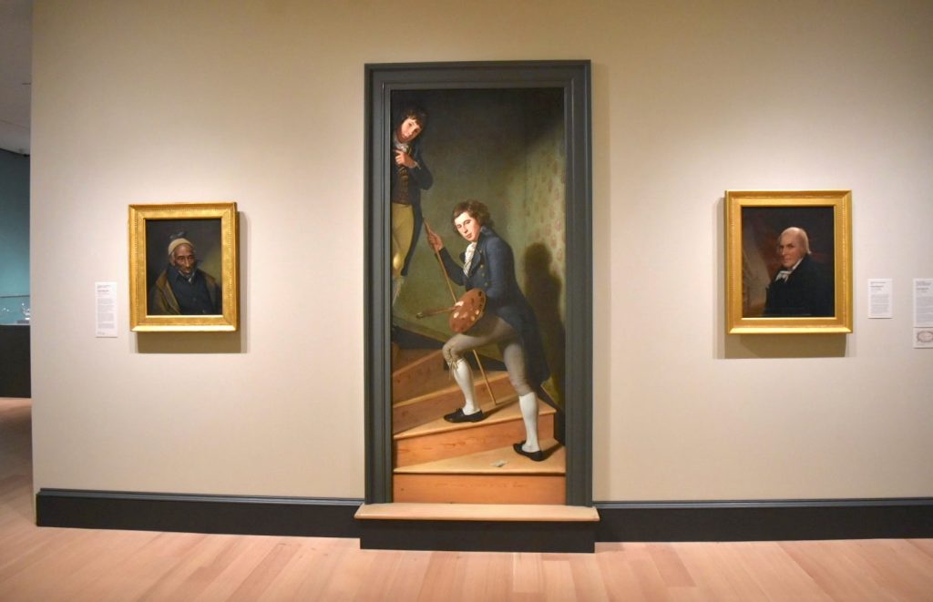 Charles Willson Peale, <em>Portrait of Yarrow Mamout</em> (1819), <em>Staircase Group (Portrait of Raphaelle Peale and Titian Ramsay Peale I)</em> (1795), and <em>Self-Portrait in the Museum</em> (1822). Photo by Ben Davis.