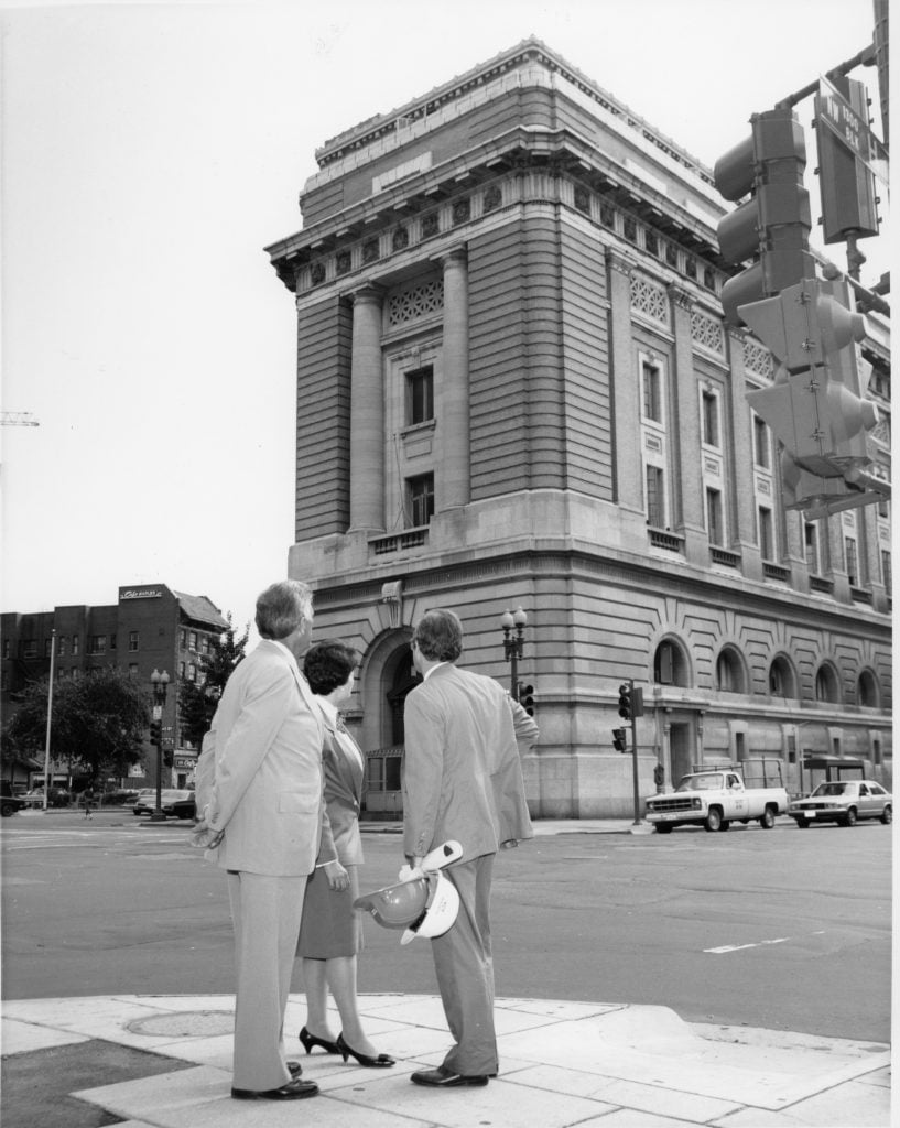 Wallace F. Holladay, husband of Wilhelma; Anne-Imelda Radice; and Coke Florance looking at the museum in an undated photo.