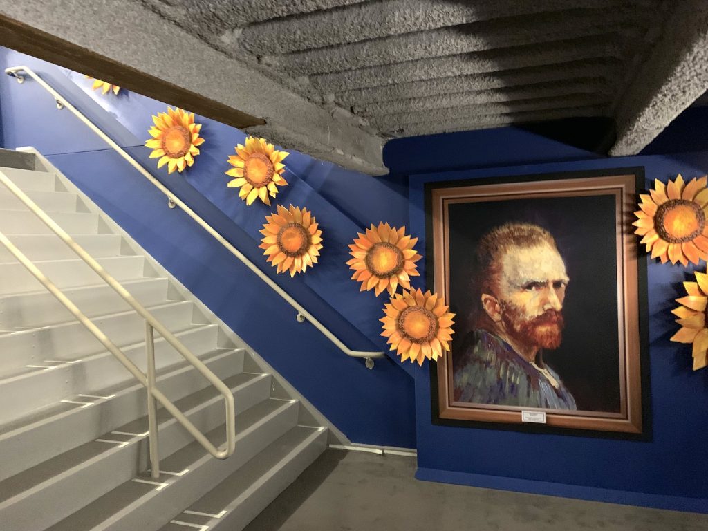 Stairway leading to "Van Gogh: The Immersive Experience." Photo by Ben Davis.