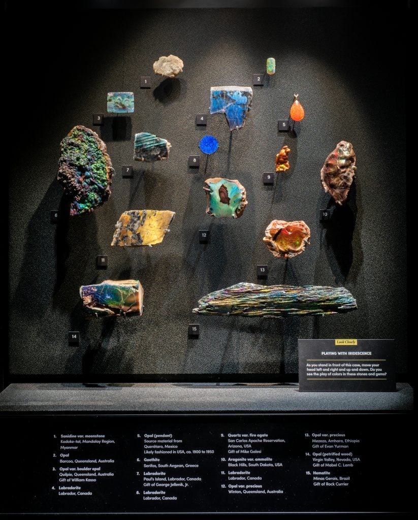 This case highlighting iridescent specimens is part of the Minerals & Light room, which explores the optical properties of minerals and their interaction with light. Photo by D. Finnin, ©AMNH.