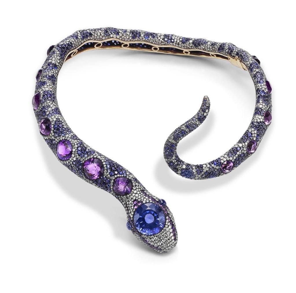American designer Joel Arthur Rosenthal has created only a few snake necklaces. This one, made in 1990, features JAR’s signature blend of pavé-set precious and semiprecious stones (sapphires, amethysts, and diamonds) in a silver and gold setting. French actress Jacqueline Delubac nicknamed the necklace “Dudule” after she acquired it from JAR. The moniker, a proper French name, could have been a play on Delubac’s last name. Photo courtesy of FD Gallery.