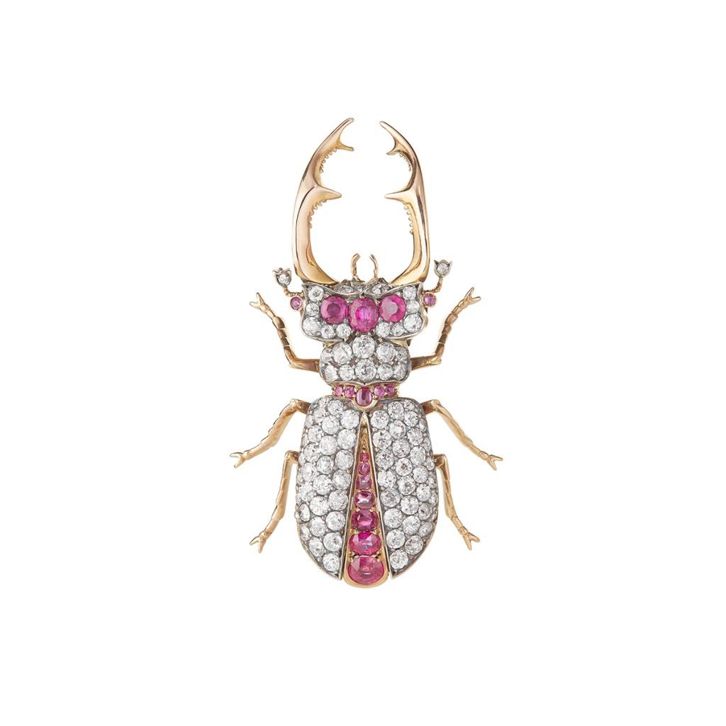 This Boucheron stag beetle brooch was made in 1895 from diamonds, rubies, gold, and white gold. The jewel has a removable pin on the back, making it possible to wear it as a pendant, hair ornament, or brooch. Photo ©Boucheron.