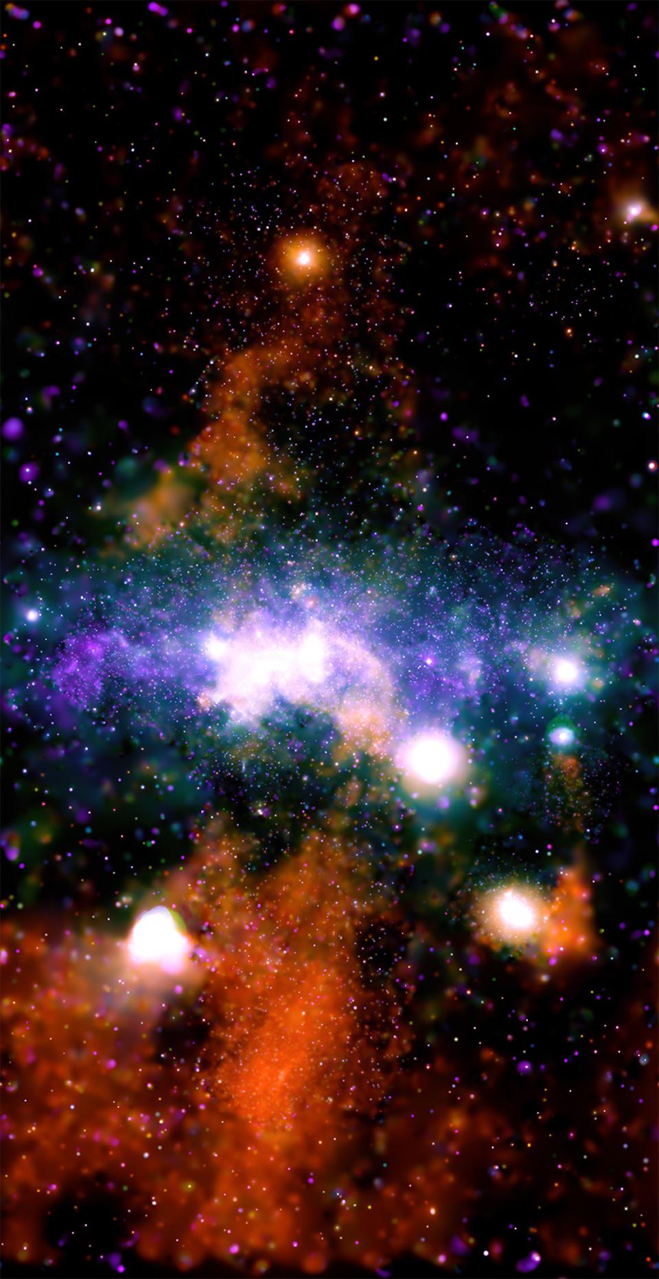 Composite image of the Galactic Center made with X-ray imagery from the Chandra X-ray Observatory. Courtesy of NASA/CXC/UMass/Q.D. Wang; Radio: NRF/SARAO/MeerKAT.