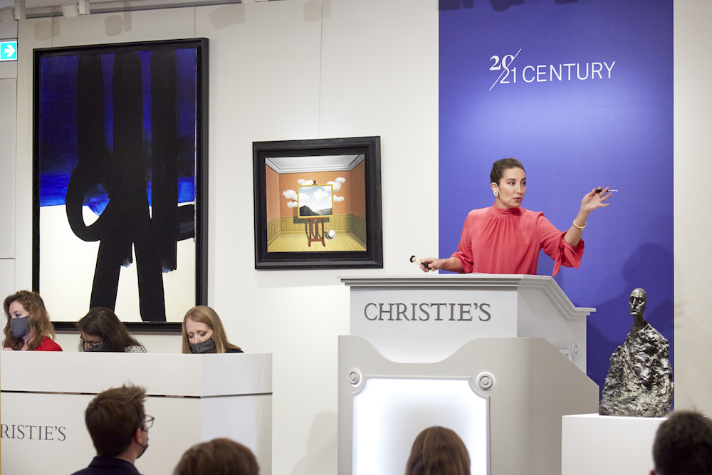 Camille de Foresta on the rostrum at Christie's Paris. Image courtesy Christie's.