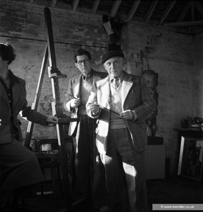 Roland Penrose and Picasso in Roland's Studio, Farley Farm, Chiddingly, England by Lee Miller. © Lee Miller Archives, England 2021. All rights reserved. leemiller.co.uk