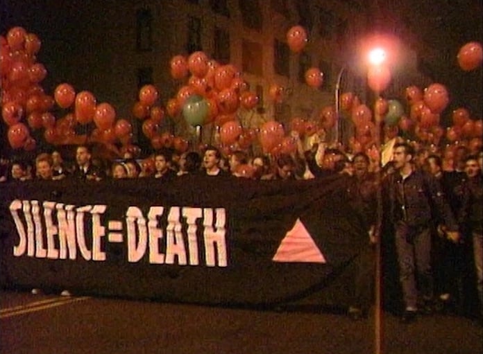Silence = Death was originally conceived by the activists Avram Finkelstein, Brian Howard, Oliver Johnston, Charles Kreloff, Chris Lione, and Jorge Socarrás. This image is a still from Gregg Bordowitz's film Fast Trip, Long Drop (1993), the work he says he is still proudest of. Courtesy the artist and Video Data Bank at the School of the Art Institute of Chicago.