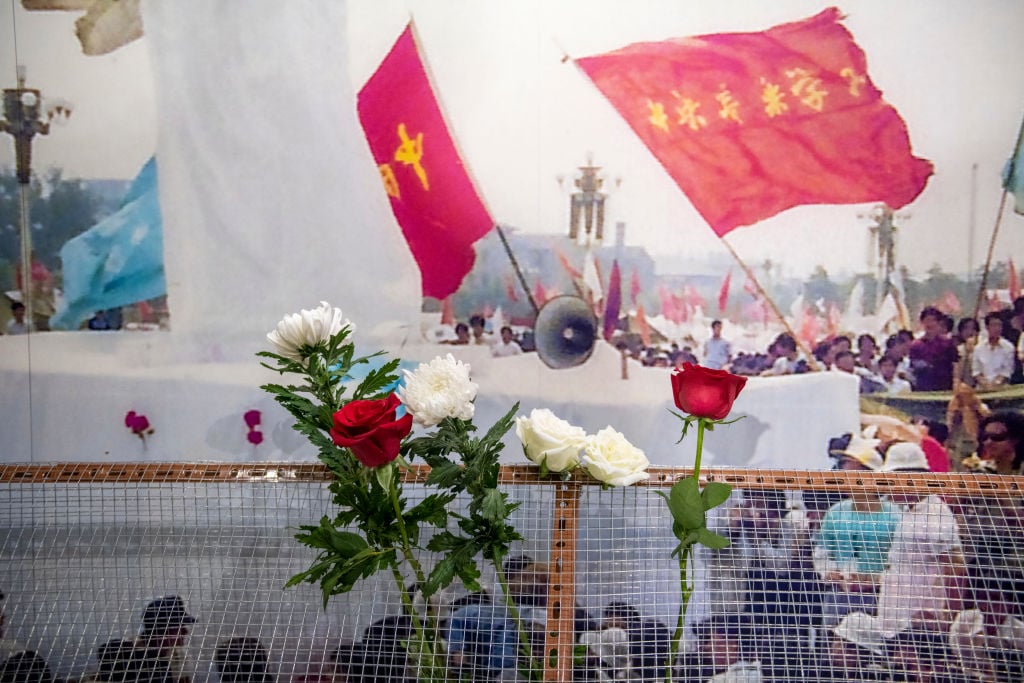 Flowers at the June 4th Museum in Hong Kong, China, 30 May 2021. Photo: Vernon Yuen/NurPhoto via Getty Images.