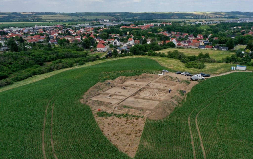 23 June 2021, Saxony-Anhalt, Eisleben: An excavation site can be seen on the hill "Kleiner Klaus" above Helfta. The rediscovered royal palace of Helfta (Mansfeld-Südharz district) is being explored in a research excavation by the Saxony-Anhalt State Office for the Preservation of Monuments and Archaeology. Archaeologists have first begun uncovering the foundation walls of the church of Emperor Otto the Great (912-973). Photo: Ronny Hartmann/dpa (Photo by Ronny Hartmann/picture alliance via Getty Images)
