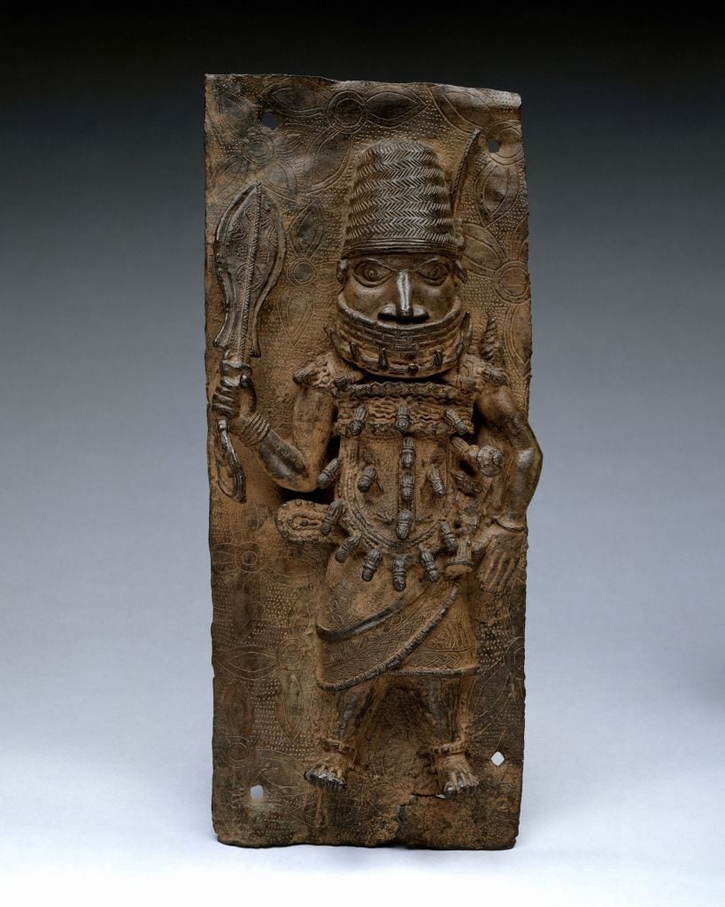 Plaque: Warrior Chief, 16th–17th century, Nigeria, Court of Benin, Edo peoples, Brass, H. 16 1/2 in. (41.9 cm), Metal-Sculpture. Photo by: Sepia Times/Universal Images Group via Getty Images.
