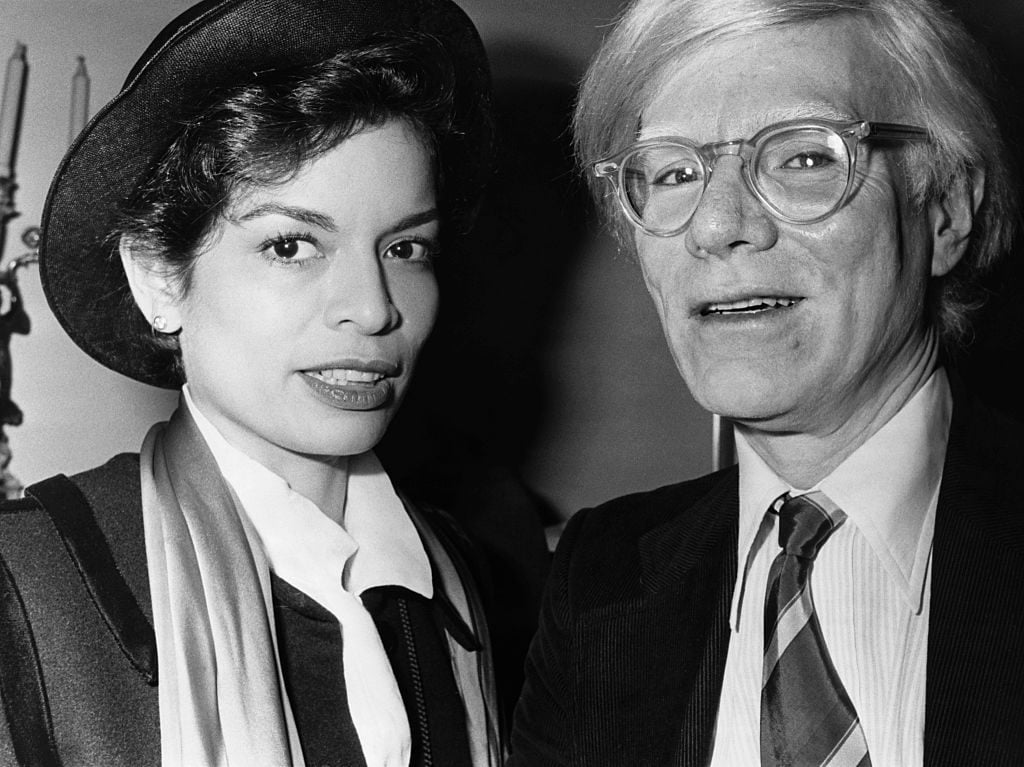 Bianca Jagger and Andy Warhol Photo by © Hulton-Deutsch Collection/CORBIS/Corbis via Getty Images.