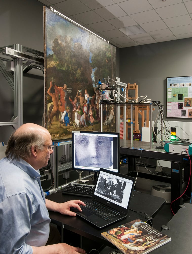 John Delaney, senior imaging scientist at the National Gallery of Art, conducting imaging of Giovanni Bellini and Titian’s The Feast of the Gods (1514/1529). Courtesy National Gallery of Art.