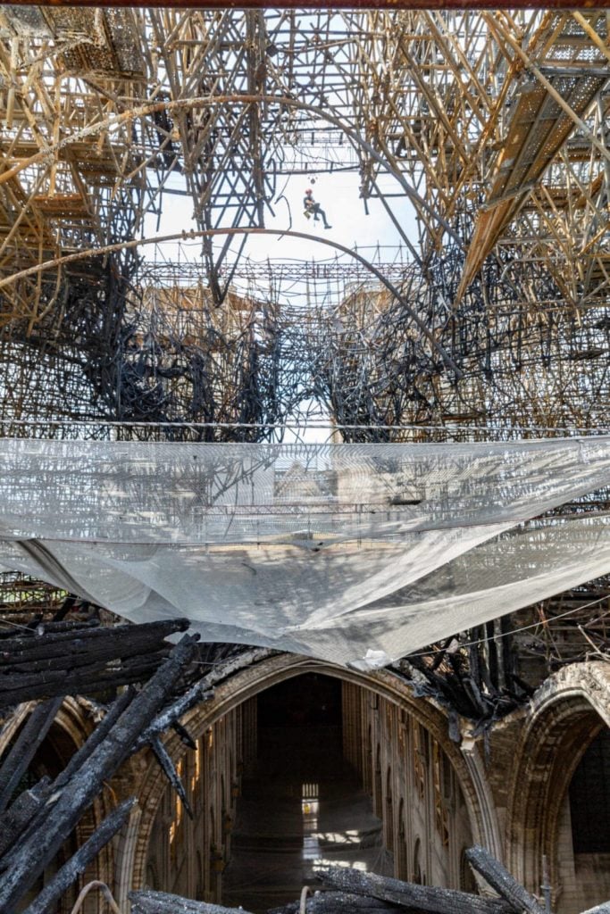 Rope technicians working to remove Notre Dame scaffolding in June 2020. Photo ©C2RMF/Alexis Komenda, courtesy of Friends of Notre Dame.