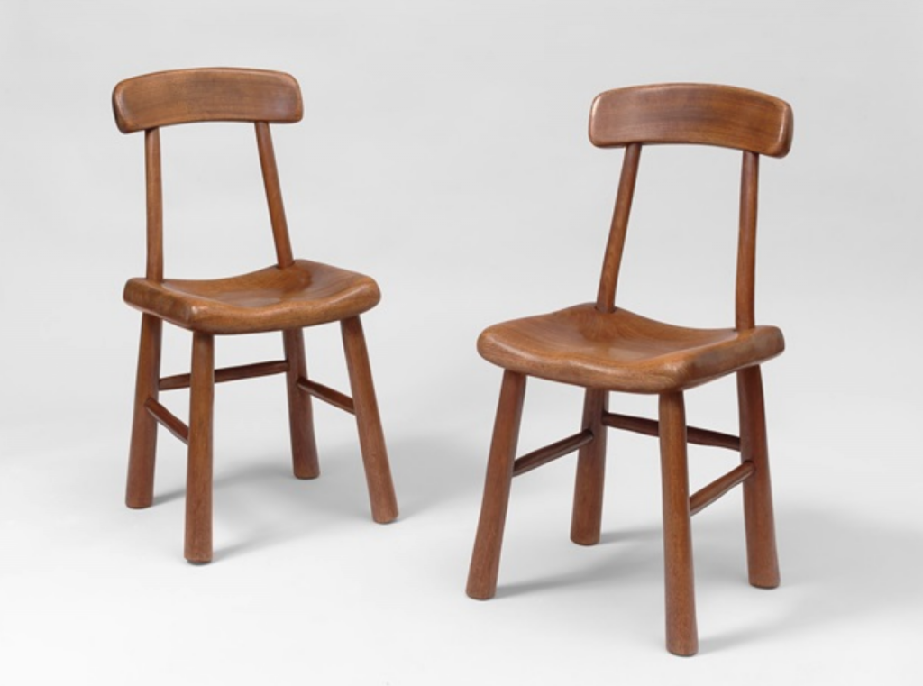 Alexandre Noll, Pair of chairs in carved mahogany (1940). Courtesy of Galerie Jacques Lacoste.
