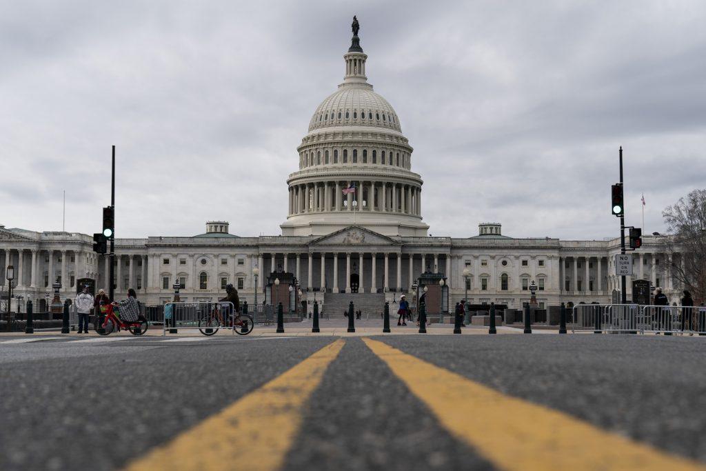 Clouds pass overt the Capitol Dome as the Senate resumes debate on the National Defense Authorization Act (NDAA) on December 31, 2020 in Washington, DC. (Photo by Joshua Roberts/Getty Images)