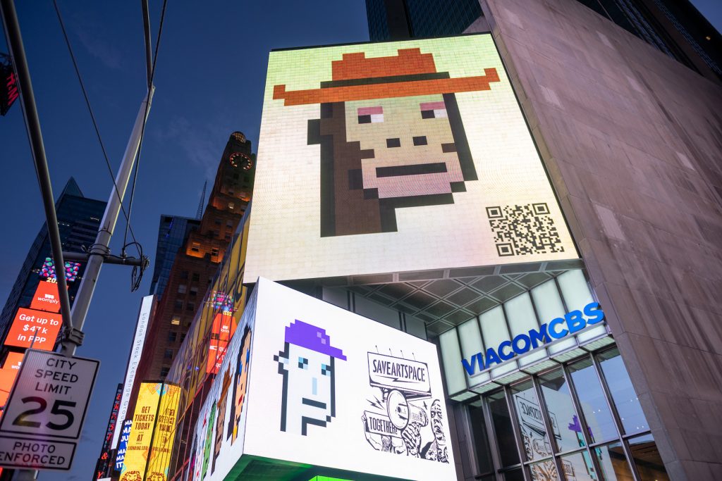 Images of CryptoPunks displayed on a digital billboard in Times Square on May 12, 2021 in New York City. (Photo by Alexi Rosenfeld/Getty Images)