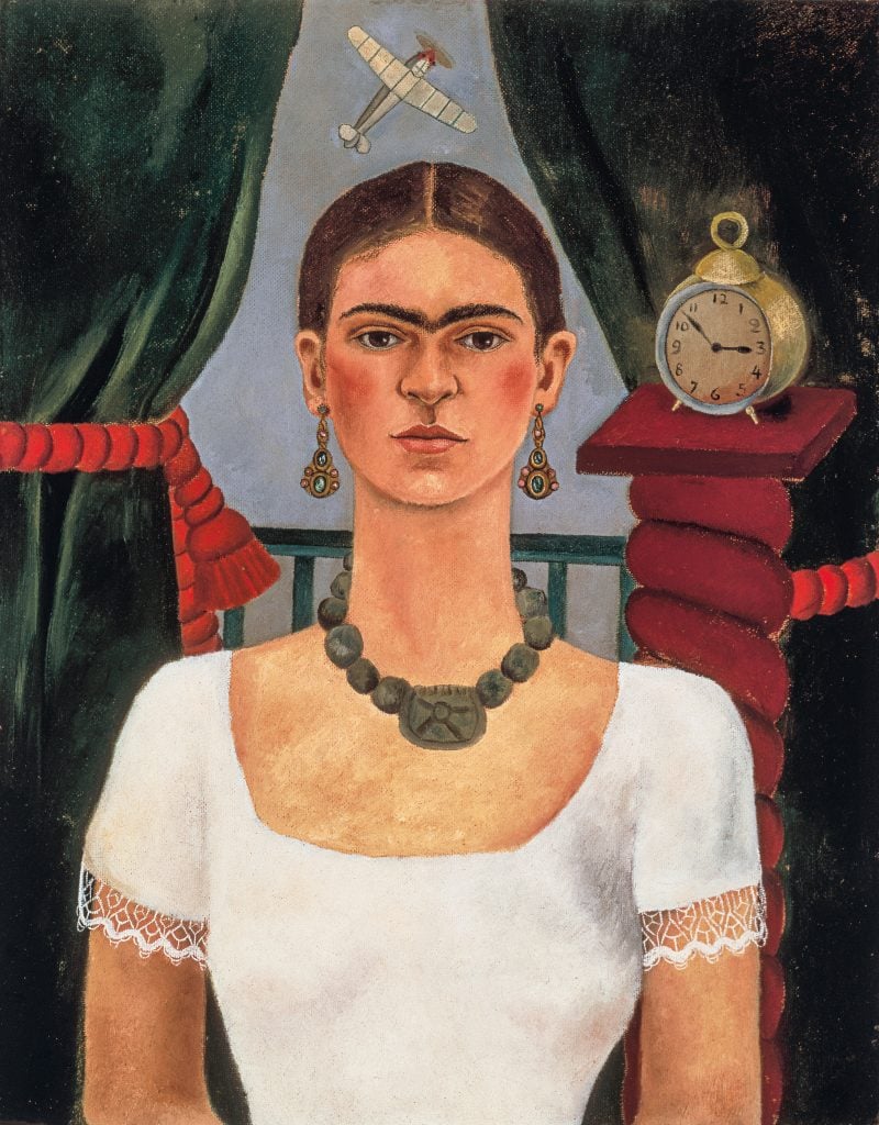 Frida Kahlo, Self-portrait (Time Flies) (ca. 1929). Photo by LML Archive, ©Banco de Mexico Diego Rivera Frida Kahlo Museums Trust/VG Bild-Kunst, Bonn 2021; reproduction authorized by the Instituto Nacional de Bellas Artes y Literatura, 2021.