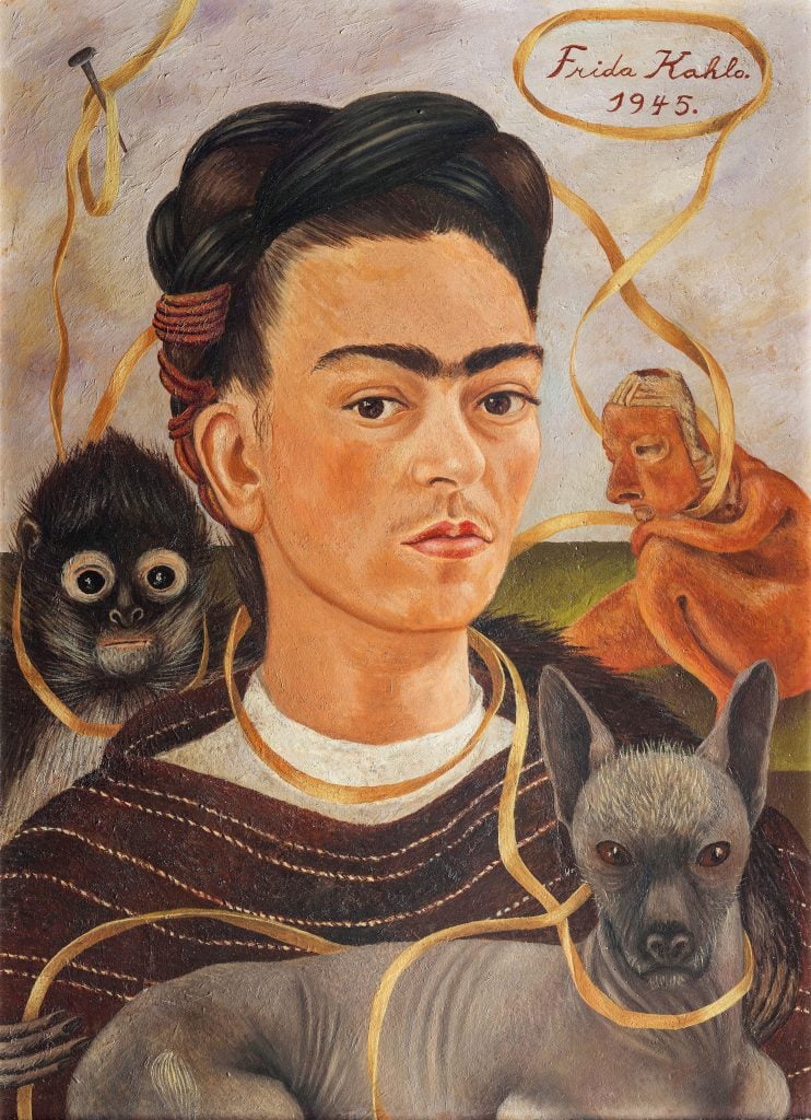 Frida Kahlo, <em>Self-portrait With Small Monkey</eM> (1945). Photo by akg-images, Museo Dolores Olmedo, Mexico City, Xochimilco, ©Banco de Mexico Diego Rivera Frida Kahlo Museums Trust/VG Bild-Kunst, Bonn 2021; reproduction authorized by the Instituto Nacional de Bellas Artes y Literatura, 2021.