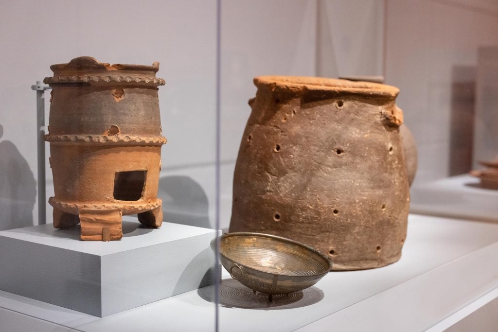 A dormouse jar (right) and other vessels in "Last Supper in Pompeii: From the Table to the Grave" at the Legion of Honor, San Francisco. Photo by Gary Sexton, courtesy of the Fine Arts Museums of San Francisco.