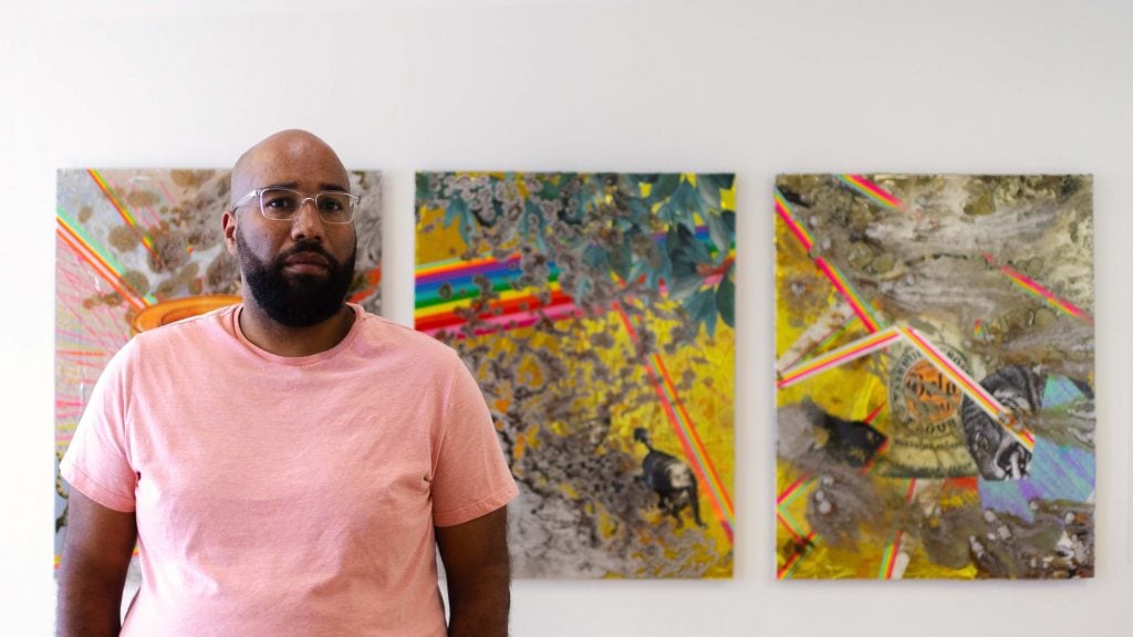 Delano Dunn with works from his series 