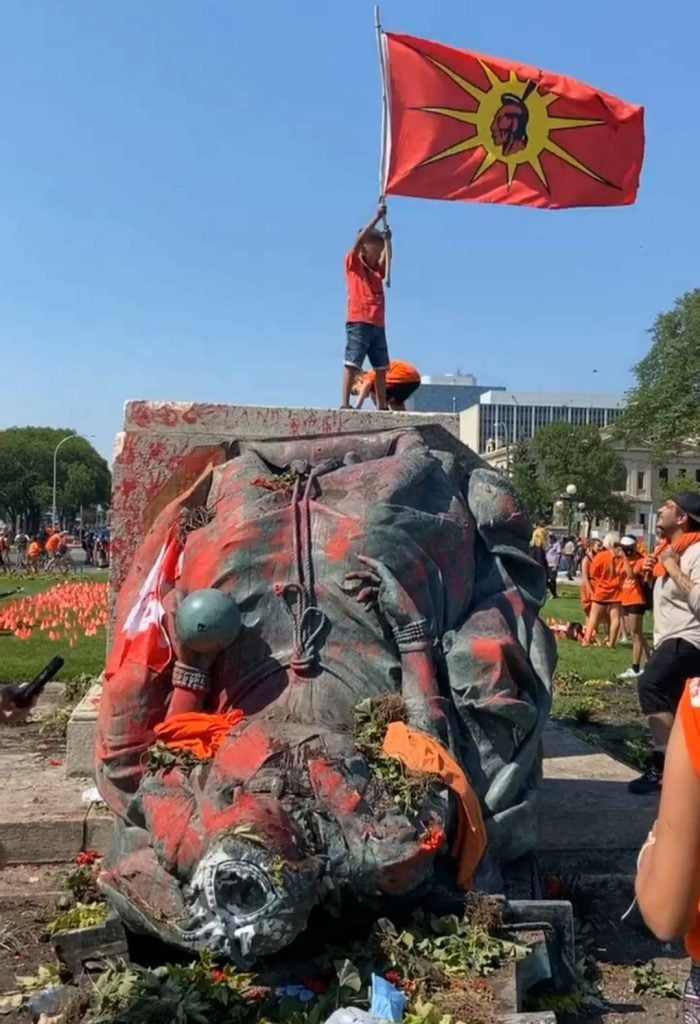 A toppled statue in Winnipeg as part of "Cancel Canada Day" protests. Courtesy Twitter.