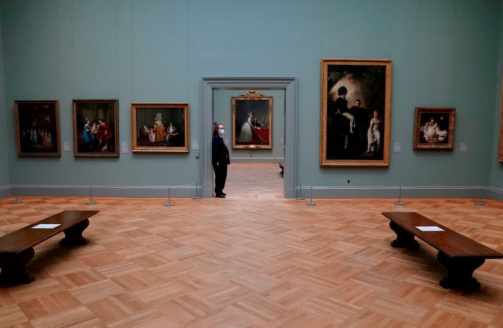 Museum guards say they've been stretched too thin. (Photo by TIMOTHY A. CLARY/AFP via Getty Images)