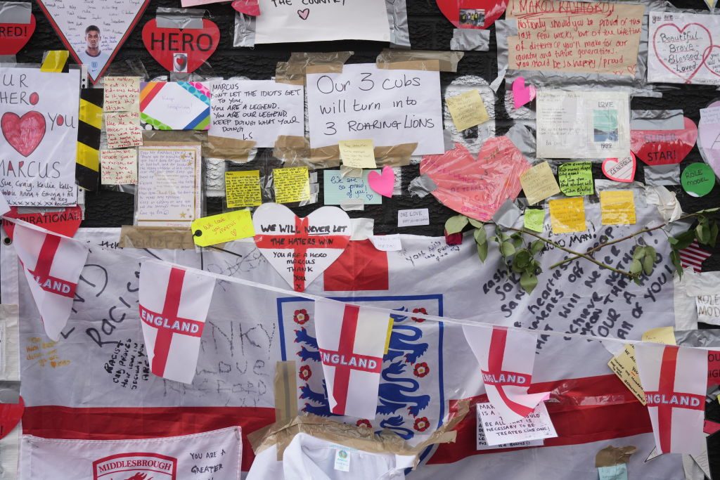 Messages of support are seen at the newly repaired mural of England footballer Marcus Rashford by the artist known as AKSE. Photo: Christopher Furlong/Getty Images.