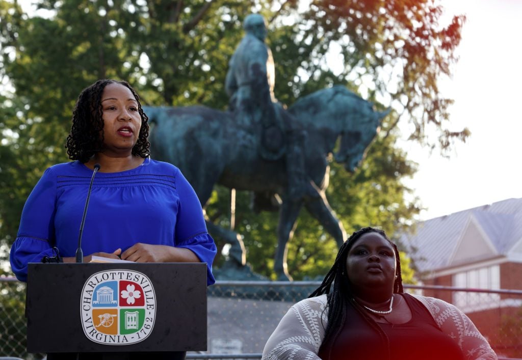Charlottesville Mayor Nikuyah Walker, left speaking before the removal of the statue of Confederate General Robert E. Lee. Zyahna Bryant is on the right. Photo: Win McNamee/Getty Images.
