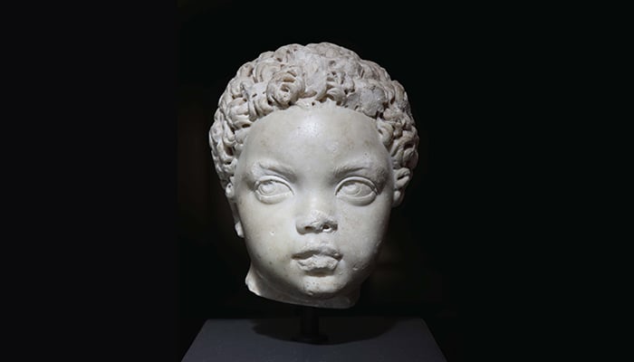 Ken Gonzales-Day, <em>Untitled</em> (2009). Photo of <em>Portrait of a child</em> (ca. 150–200), Roman marble, collection of the J. Paul Getty Museum, Los Angeles. Photo courtesy of the artist and Luis de Jesus, Los Angeles.