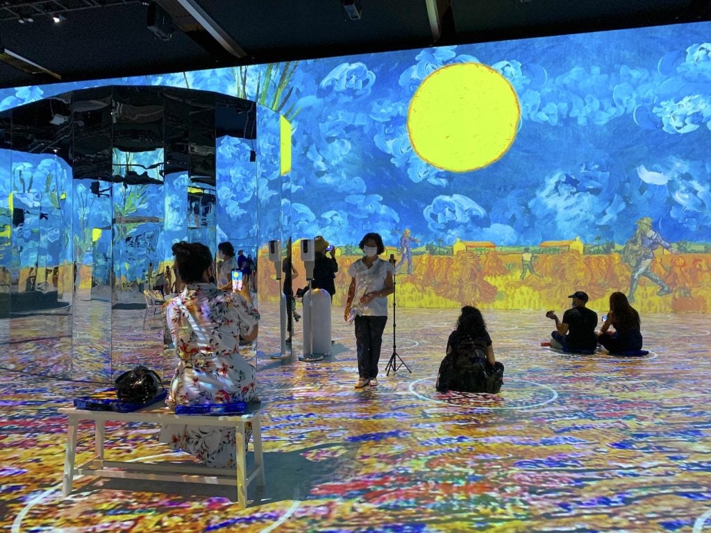 Inside the main chamber of Immersive Van Gogh, with the mirrored partitions at left. Photo by Ben Davis.