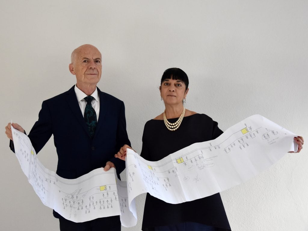 Researchers Alessandro Vezzosi and Agnese Sabato with their Leonardo da Vinci Family tree. Photo courtesy of Alessandro Vezzosi and Agnese Sabato.
