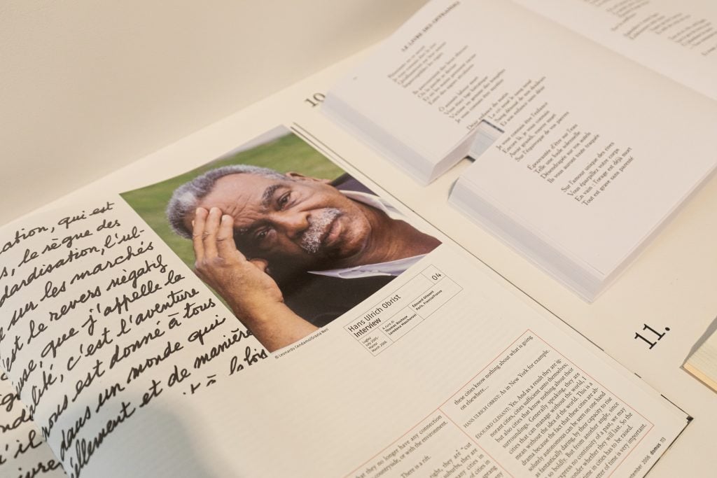 A photograph of Édouard Glissant alongside documents from one of his many conversations with Hans Ulrich Obrist. Photo: Adrian Deweerdt.