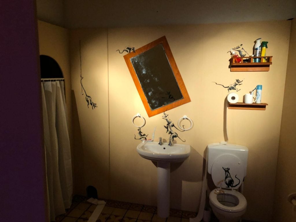 "The Art of Banksy: Without Limits" in Vienna included this replica of the artist's mural in his bathroom, painted during lockdown in spring 2020. Photo courtesy of "The Art of Banksy: Without Limits."