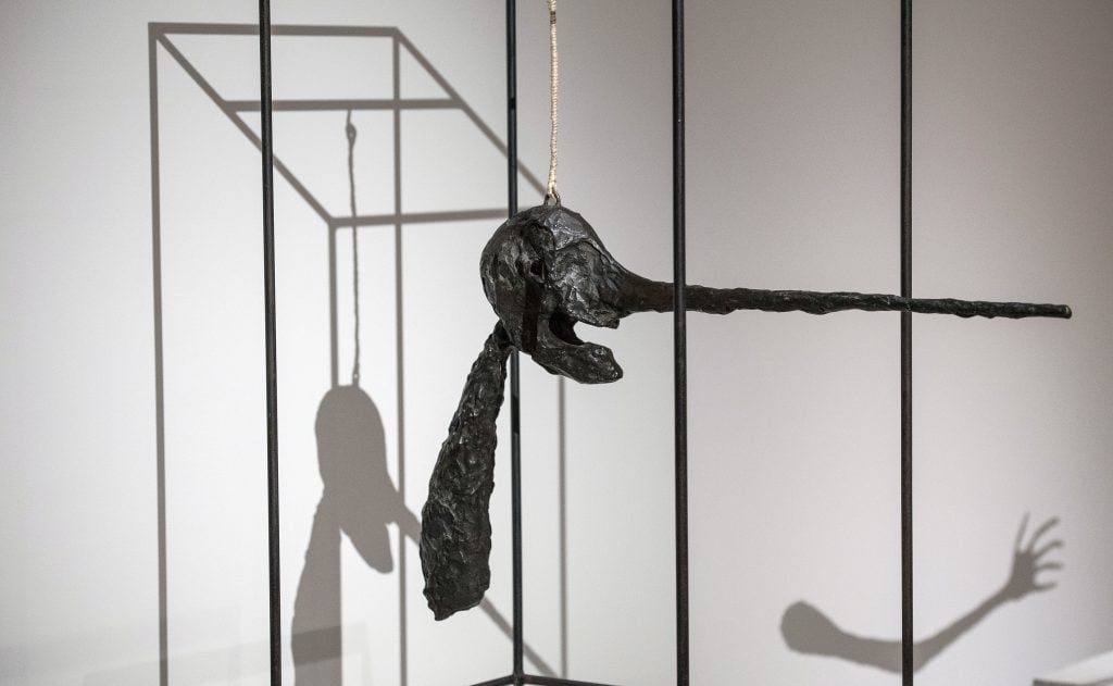 The bronze sculpture <em>Le nez</eM> or <em>The Nose</em> by Alberto Giacometti throwing a shadow at Schirn art hall in Frankfurt/Main, Germany. Photo by Boris Roessler/picture alliance via Getty Images)