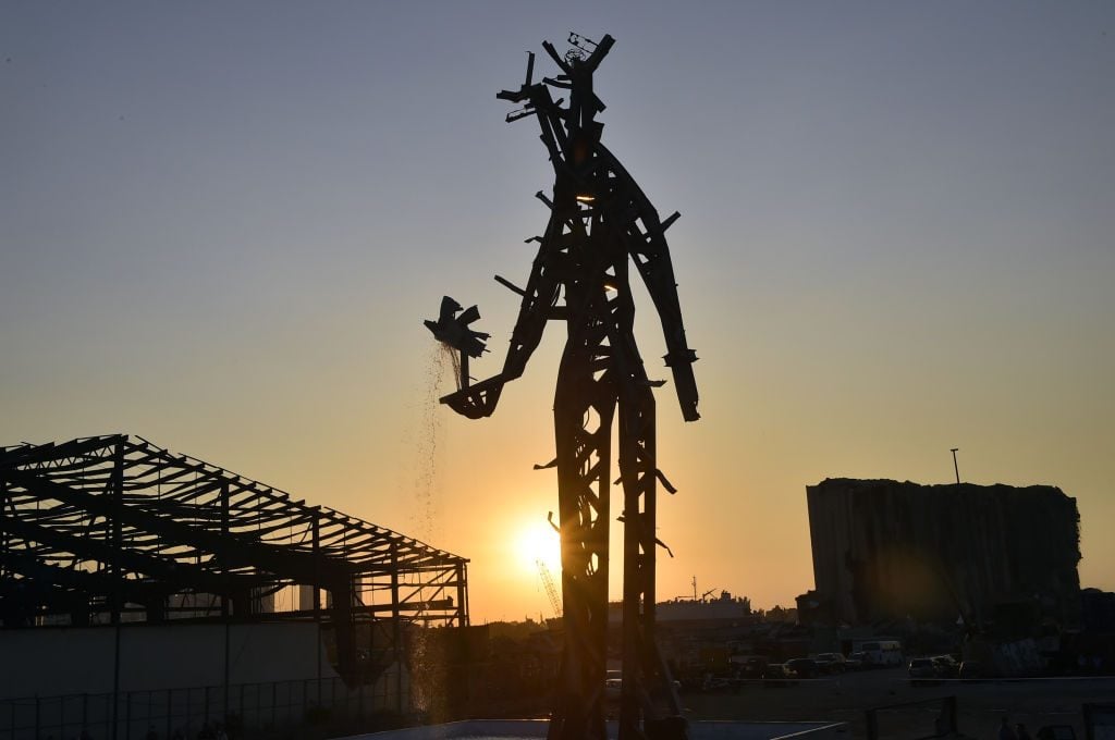 A view of a newsteel sculpture dubbed <i>The Gesture</i> by Lebanese artist Nadim Karam, made from debris resulting from the aftermath of the blast at the port of Lebanon's capital Beirut. Photo: Houssam Shbaro/Anadolu Agency via Getty Images.