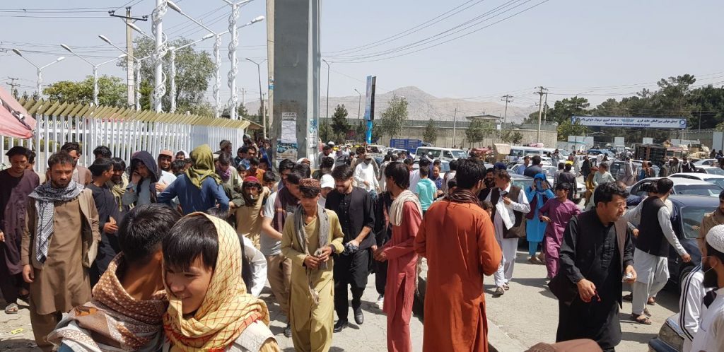 Thousands of Afghans rush to the Kabul International Airport as they try to flee the Afghan capital on August 17, 2021. (Photo: Sayed Khodaiberdi Sadat/Anadolu Agency via Getty Images)