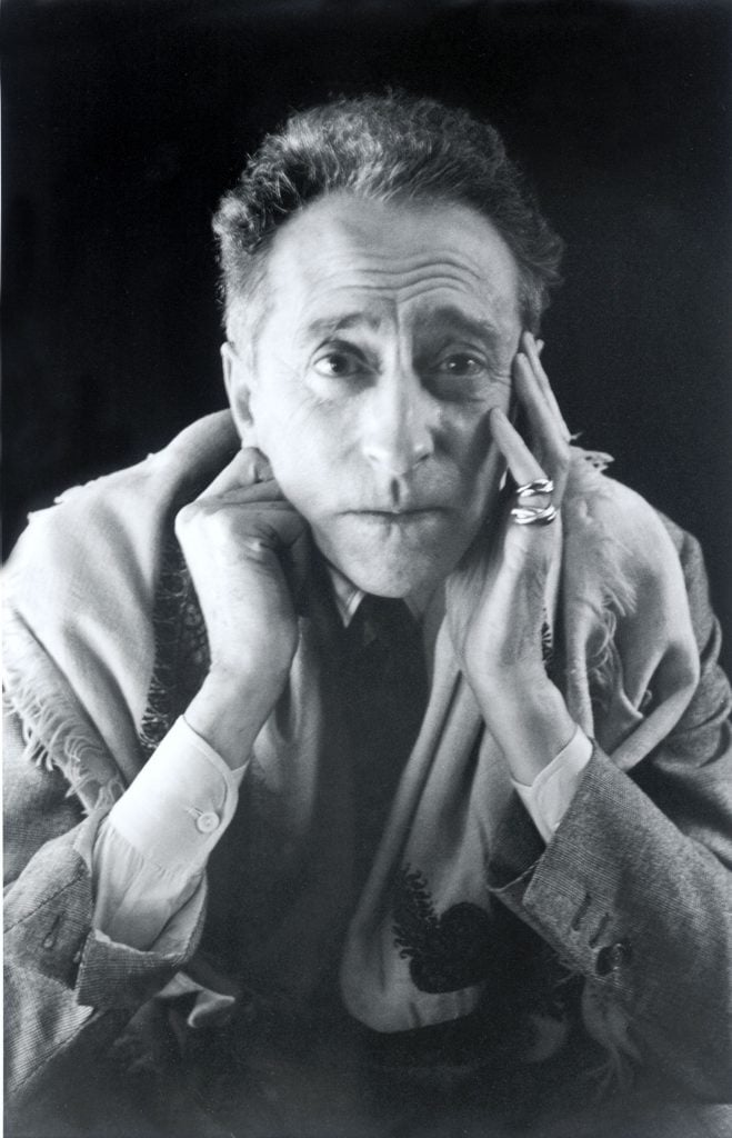 Jean Cocteau photographed in his Trinity rings by Luc Fournol in the early 1960s. Photo courtesy Cartier.