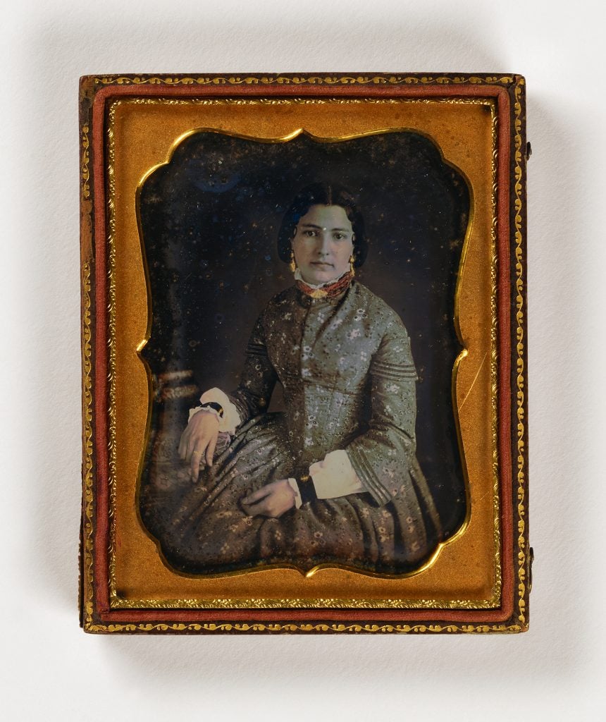 Augustus Washington, <i>Untitled (woman with books)</i>, undated, quarter-plate daguerreotype. Courtesy of the Smithsonian American Art Museum.