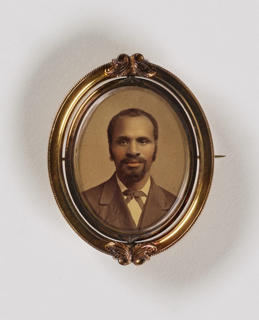 Unidentified artist, <i>Untitled (brooch, man with goatee)</i>, undated, albumen print in metal setting. Courtesy of the Smithsonian American Art Museum.