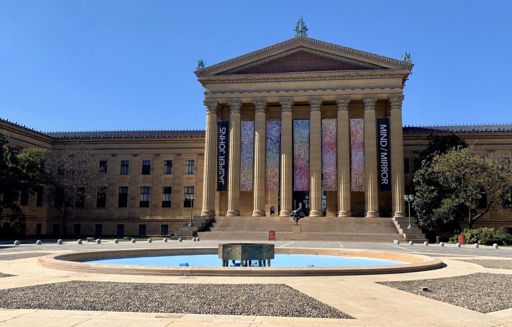 The Philadelphia Museum of Art, with banners for "Jasper Johns: Mind/Mirror." Photo by Ben Davis.