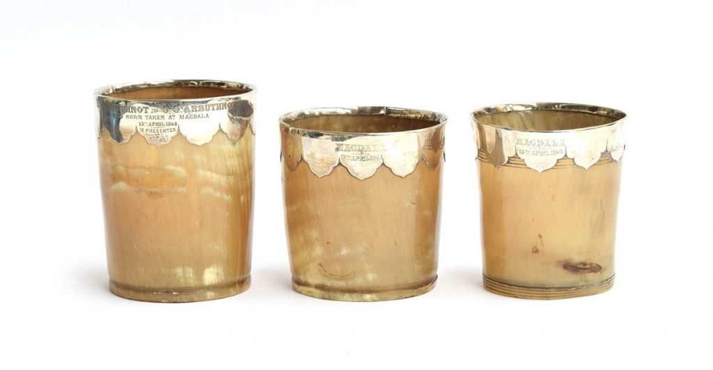 The three horn beakers, with silver plates inscribed “Magdala” and “taken at Magdala” were pulled from auction and are being restituted to Ethiopia. Photo courtesy of Busby.
