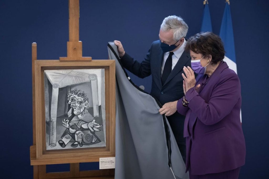 France's financial and cultural ministers unveiling one of the works by Picasso. Courtesy of France Cultural Ministry.