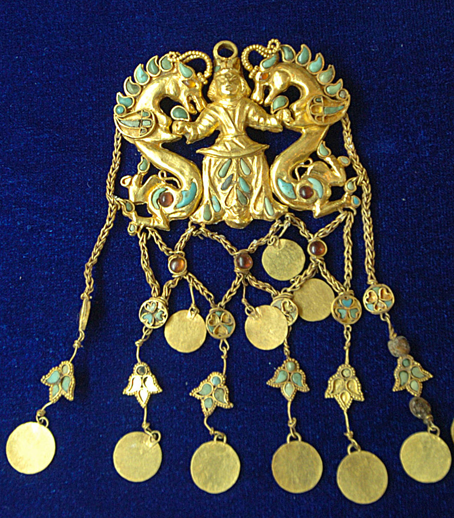 A golden hair ornament among artifacts on display at an exhibition of Bactrian Treasure at the Presidential Palace in Kabul in 2006. Photo: FARZANA WAHIDY/AFP via Getty Images