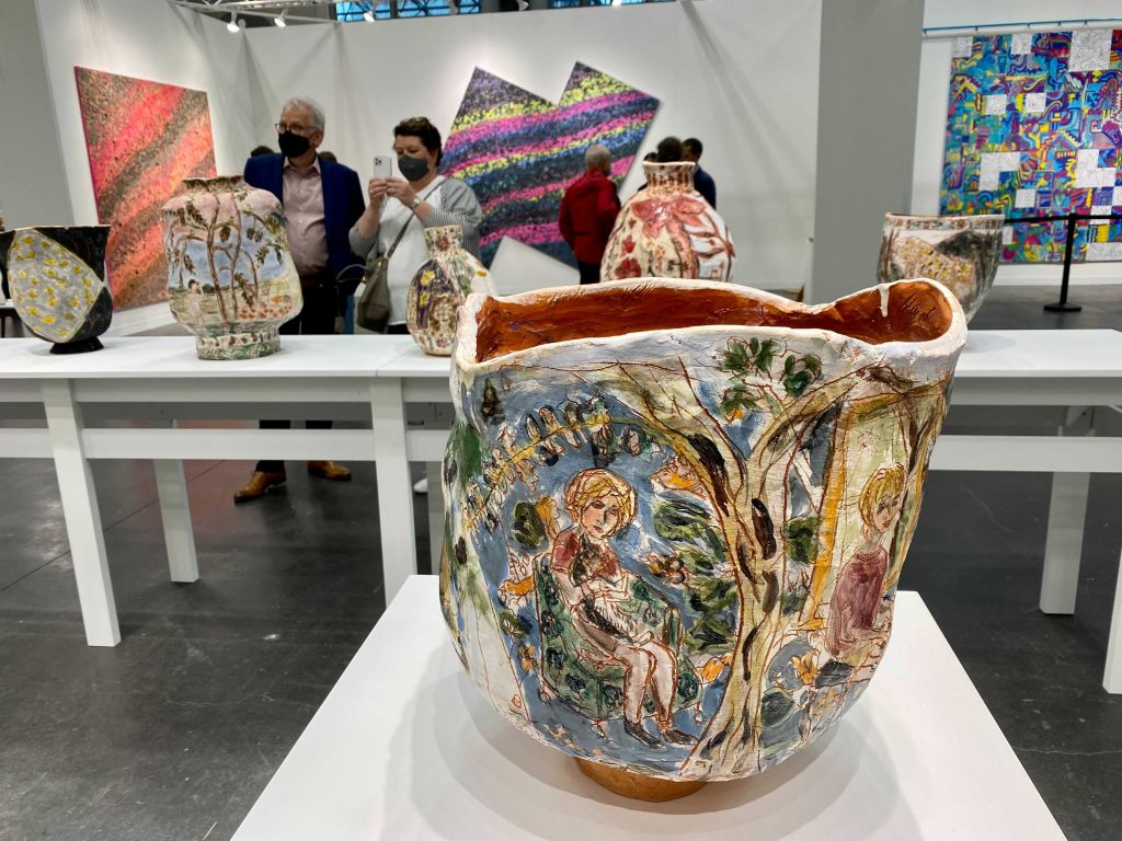 Ceramics by Jennifer Rochlin from the Pit, Los Angeles and Palm Springs, in front of works by Alteronce Gumby from False Flag, New York, at the 2021 Armory Show at the Javits Center in New York. Photo by Sarah Cascone.