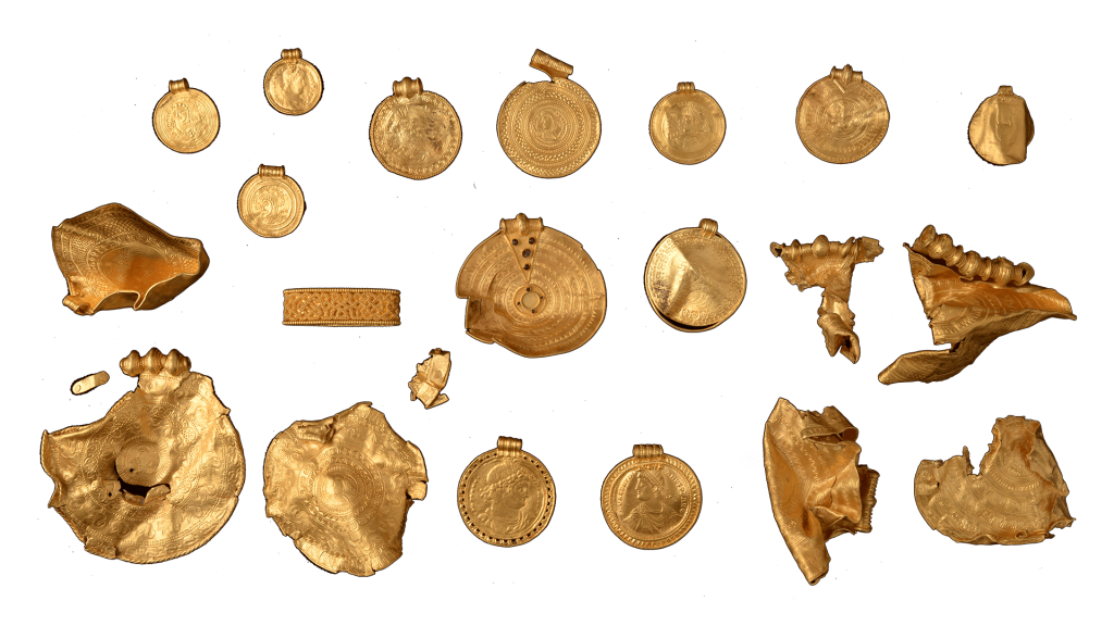 A first-time metal detectorist discovered this golden treasure from the Iron Age in a field near Jelling, Denmark. Photo courtesy of the Vejlemuseerne, Denmark, Conservation Center Vejle.