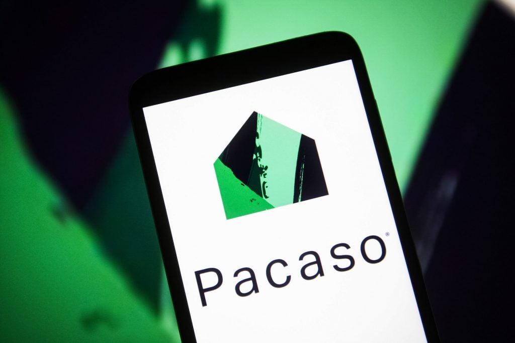 The logo of property co-ownership sales and management platform Pacaso on a smartphone screen. (Photo Illustration by Pavlo Gonchar/SOPA Images/LightRocket via Getty Images)