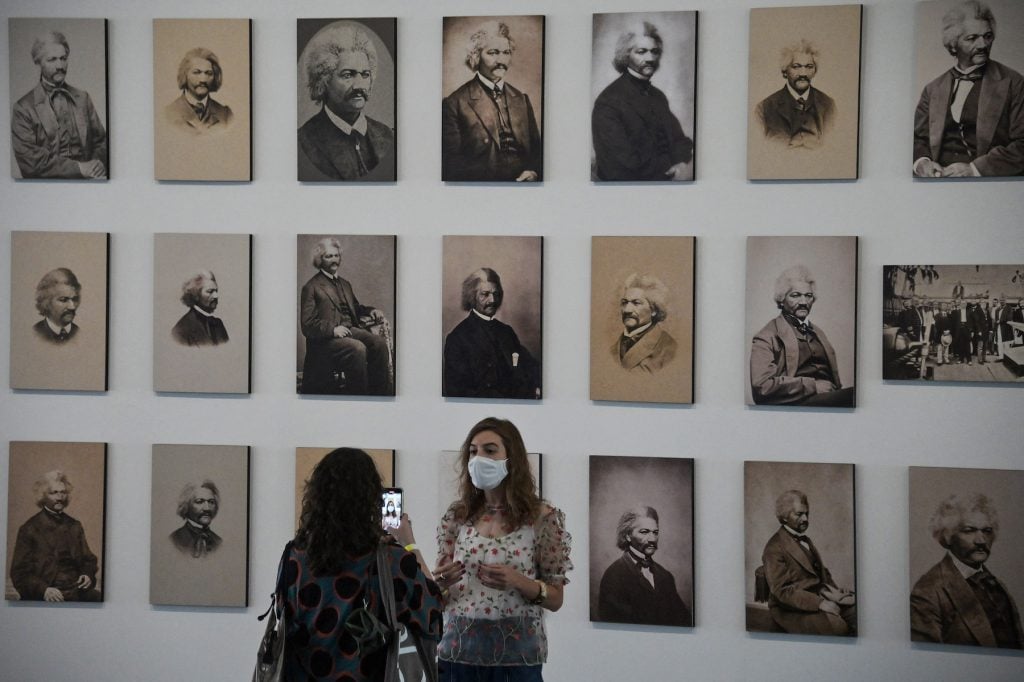 Pictures of Frederick Douglas on view at the 34th Biennale of Sao Paulo, at Ibirapuera park, in Sao Paulo, Brazil. (Photo by Nelson Almeida/AFP via Getty Images)