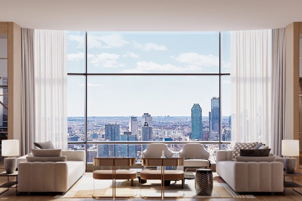 The floor-to-ceiling windows create the sensation of being within the sky itself.